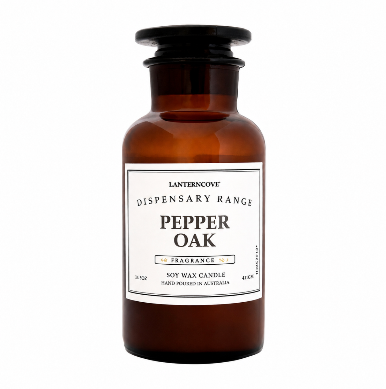 A 16oz amber glass apothecary-style candle bottle with a black screw cap and a white label reading 'Lanterncove Dispensary Range Pepper Oak Fragrance'.